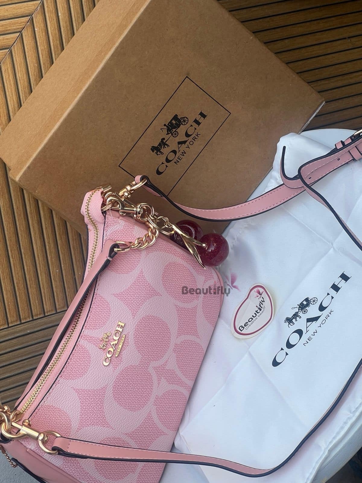 F98038F9-0E2D-4567-8Cdd-Eb420E28F084 Coach shoulder bag with cherry charm beautifly. Com. Pk 2